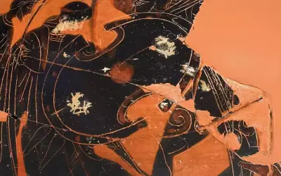 Scène de la mort d'Achille sur une poterie grecque antique. Des guerriers en armure se battent autour du héros tombé.