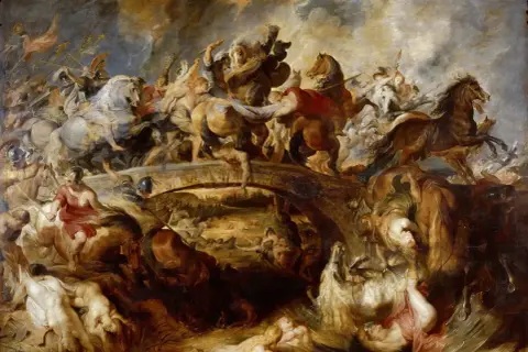 La bataille acharnée des Amazones sur un pont, où hommes et chevaux s'affrontent dans un chaos dramatique.