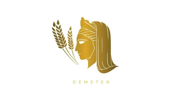 Profil doré d'une déesse des moissons, tenant des épis de blé. Le nom "DEMETER" est inscrit en dessous.
