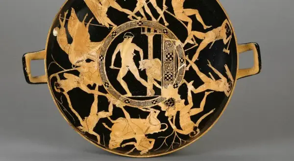 Vase antique représentant une scène de mythologie grecque : un homme combat un taureau, entouré de figures en mouvement.