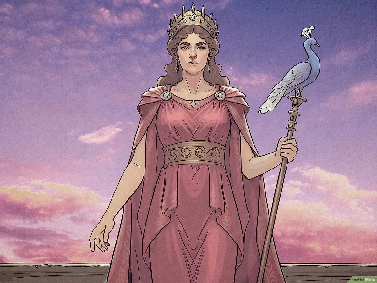 La déesse Héra, couronnée et vêtue de rose, tient un sceptre surmonté d'un paon. Sa signification est celle de la royauté et de la protection du mariage.