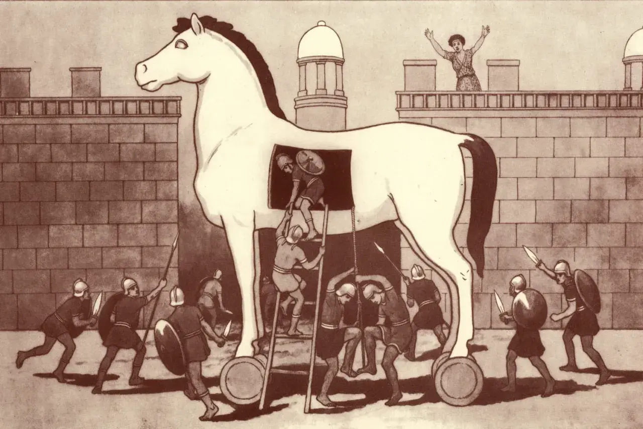 Le cheval de Troie, un stratagème de la mythologie grecque, est introduit dans la cité. Des guerriers grecs sortent de sa panse.